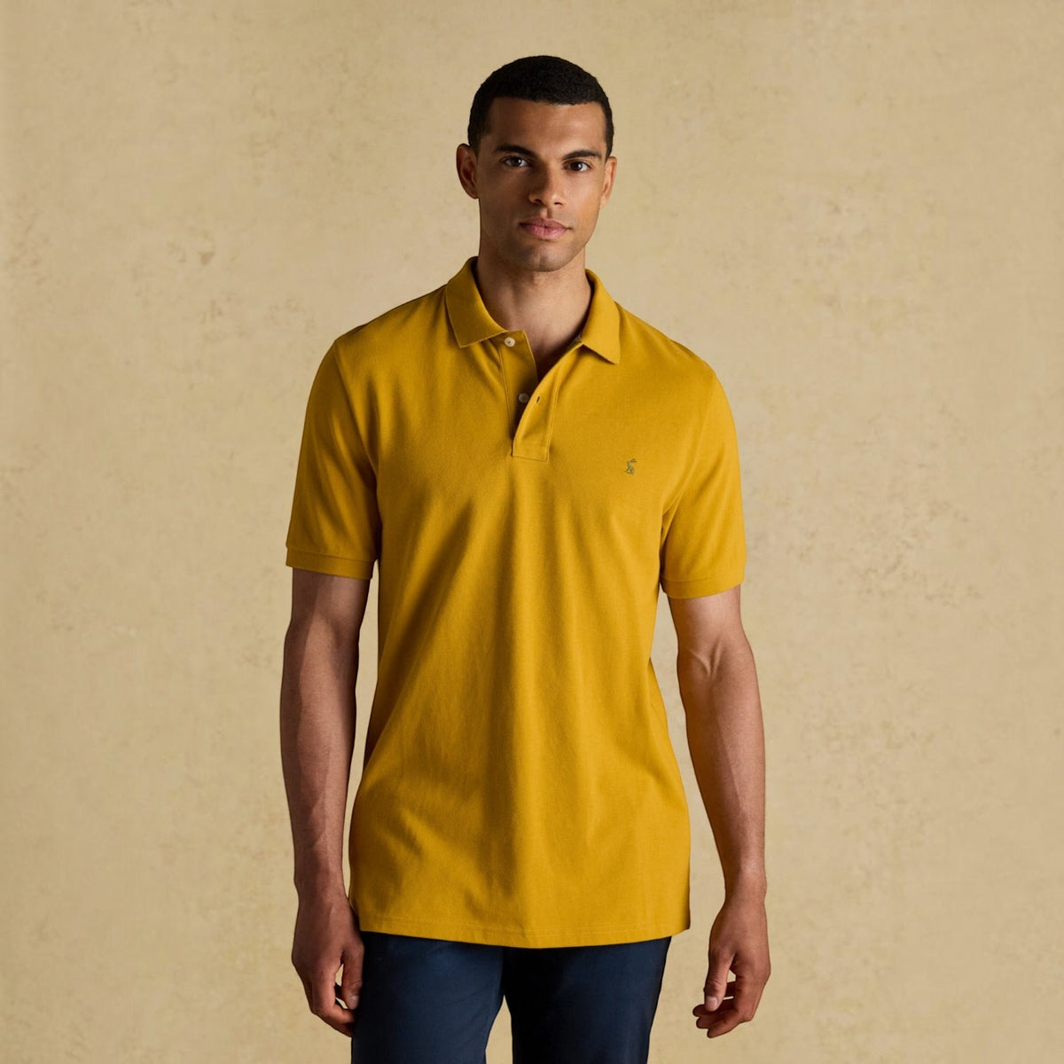 BATA LTD Joules Woody mustard yellow cotton pique polo shirt with short sleeves and embroidered chest hare logo