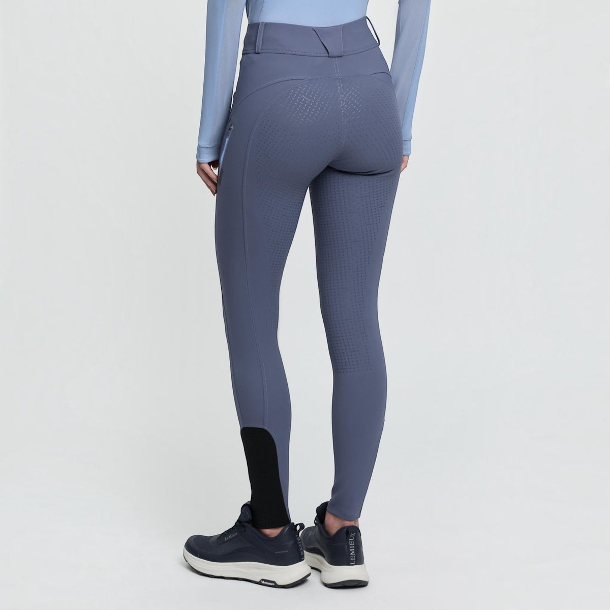 BATA LTD LeMieux Amy breggings in grey with a silicone grip seat, side phone pocket, and tapered leg fit.