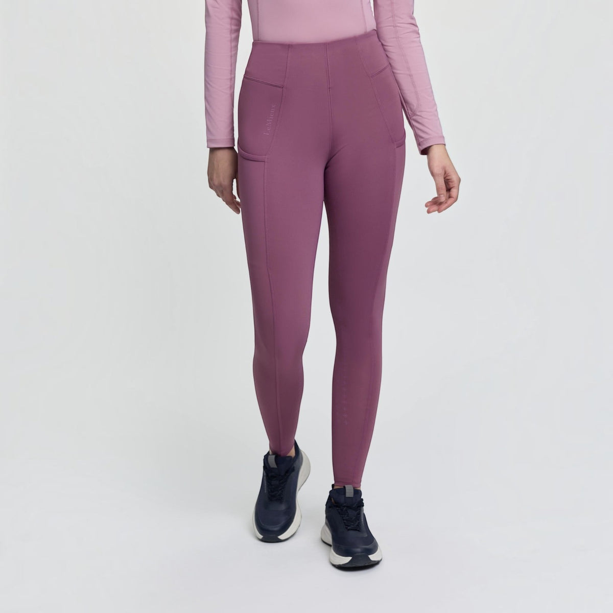 BATA LTD LeMieux Naomi pull-on breeches in mauve with side pockets and seamless stretchy fabric for riding.