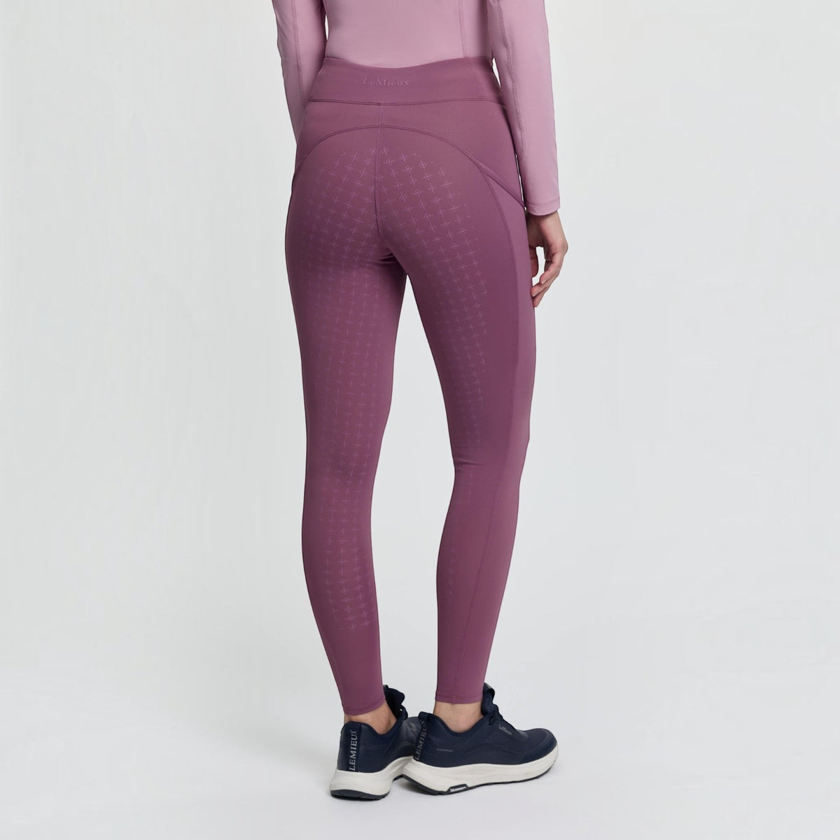 BATA LTD LeMieux Naomi pull-on riding breeches in plum with a silicone grip seat and supportive elastic waistband.